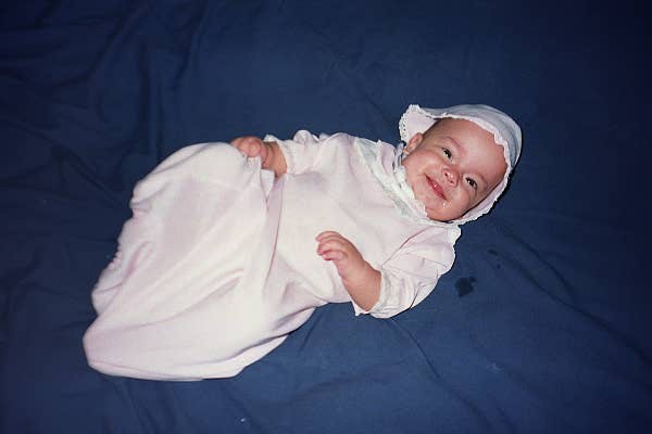 Helena at 6 months in Joia No�l's newborn gown