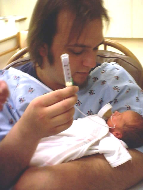 Josh holds feeding tube