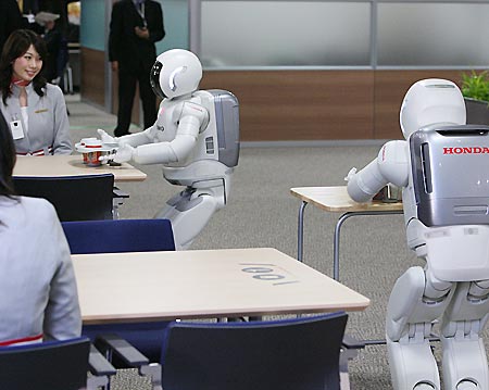 picture of ASIMO serving drinks to people