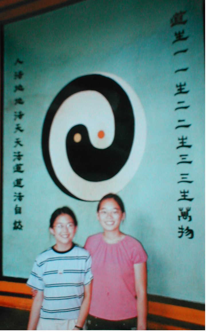 Elisha and me in front of the Daoism symbol: the Yin-Yang