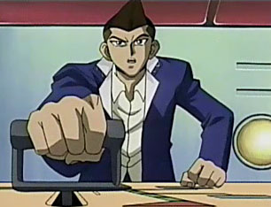 Pulling the lever to send Joey, Yugi, and Mokuba to what could be their doom. NAHAHAHA!