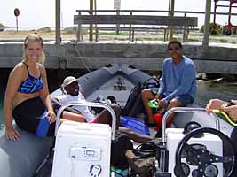 Karen, Manny, and Dr. Murphy on dive boat