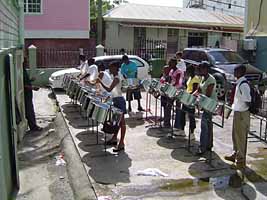 Steel pan lessons outside Cultural Division building