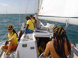 Huey Too crew in Rasta hats