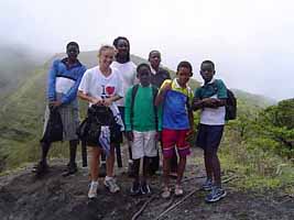 Amber, Gary, and boy scouts on volcano rim