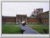 The courtyard at the Vatican Museum with the dome of St. Peter's visible