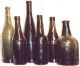 antique black glass bottles