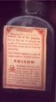 antique poison bottle