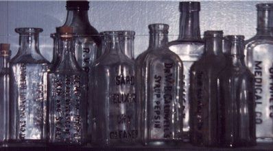 antique embossed medicine bottles