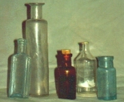 blue on left has extra glass left form punty stick