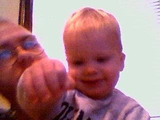 Evil supergenius Adam X prepares to throw the master control switch to the Global Destructo-Ray while his dim-witted lackey looks on.