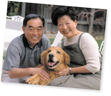 Alan and his wife, Sue, at home with their dog