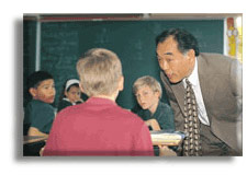 Alan visits students in the classroom