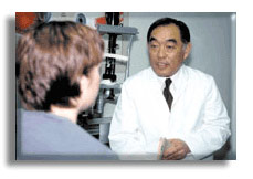 Alan listens to a patient