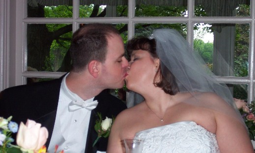 The new couple express their affection during the reception brunch