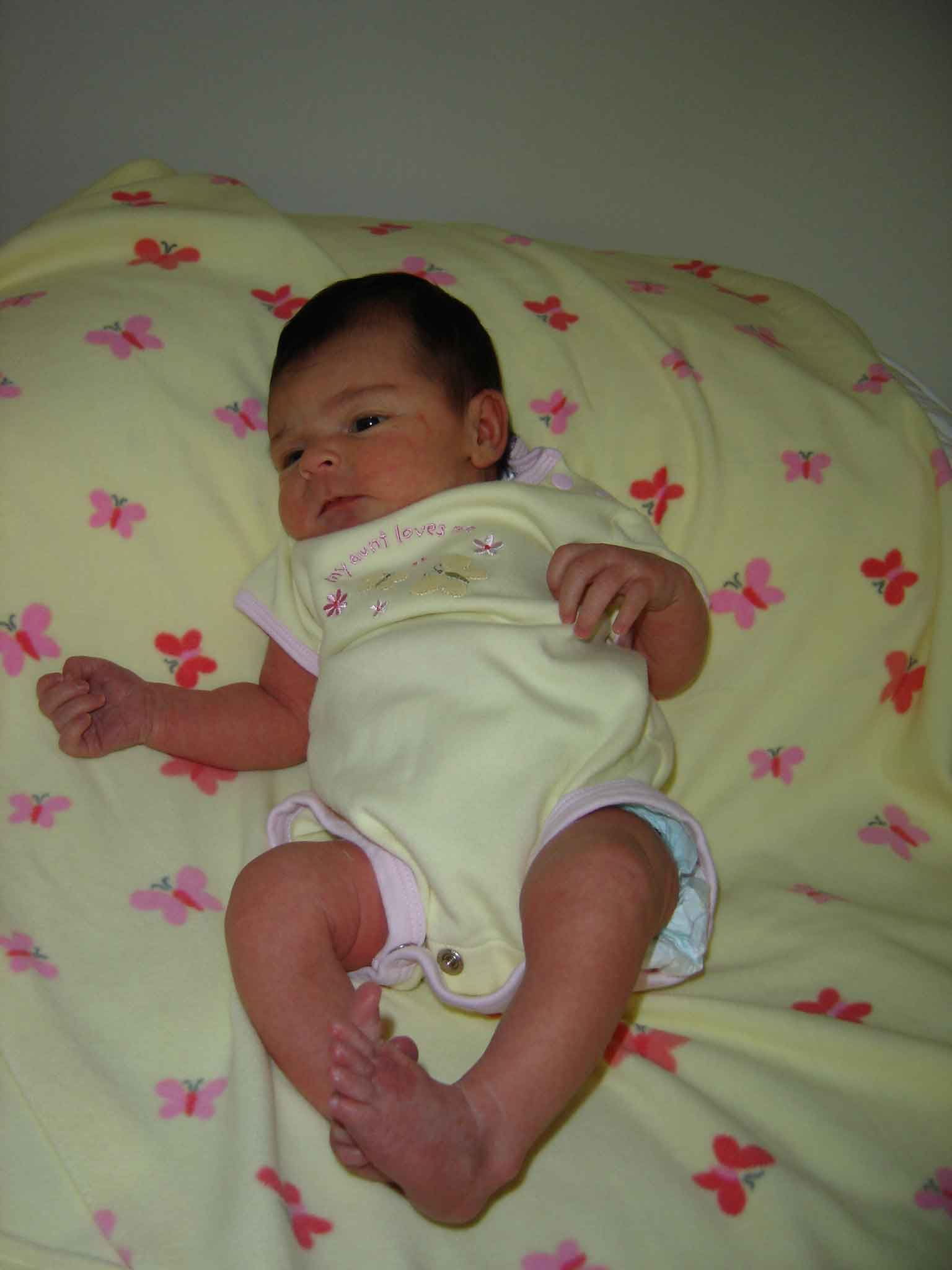 She seems to have Daddy's legs and feet!