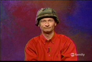 Ryan Stiles in army helmet (Reminds you of Hot Shots part Deux)