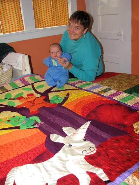 Oliver with Chichi on his quilt