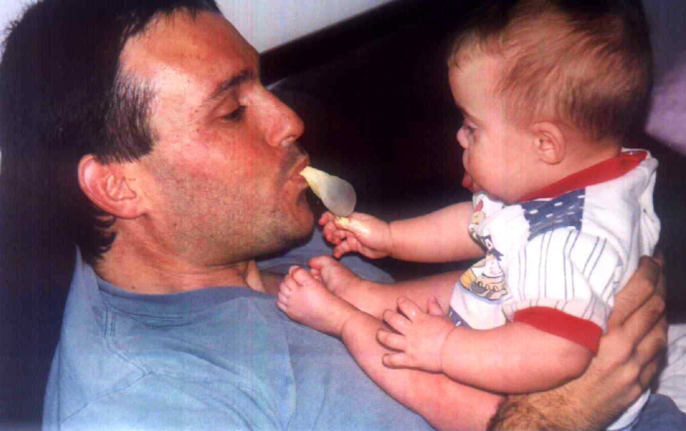 Brit playing with daddy's gum