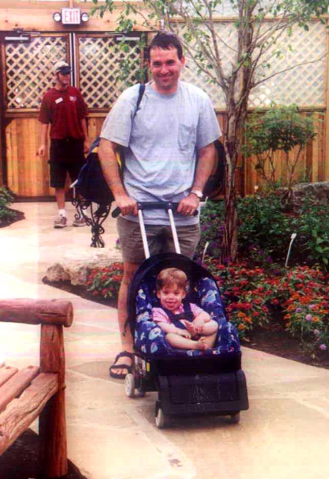 Brit and Daddy in the butterfly house