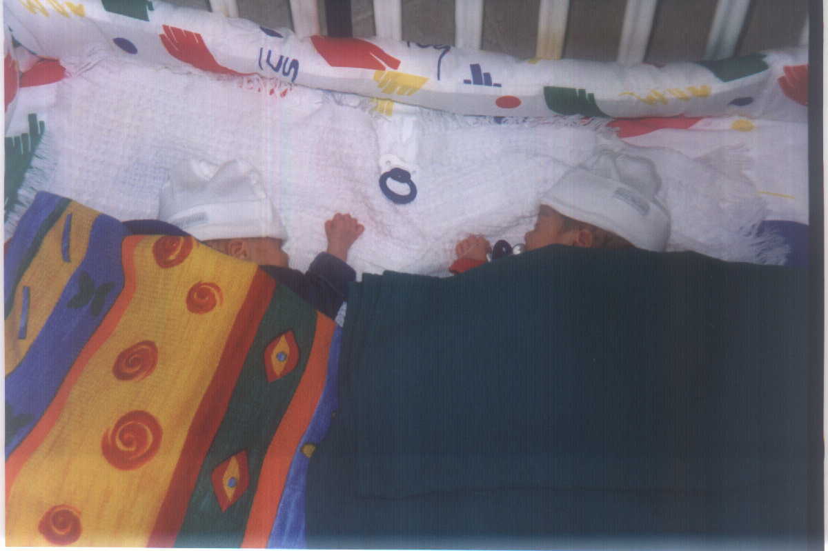 Brit and Zach in their playpen