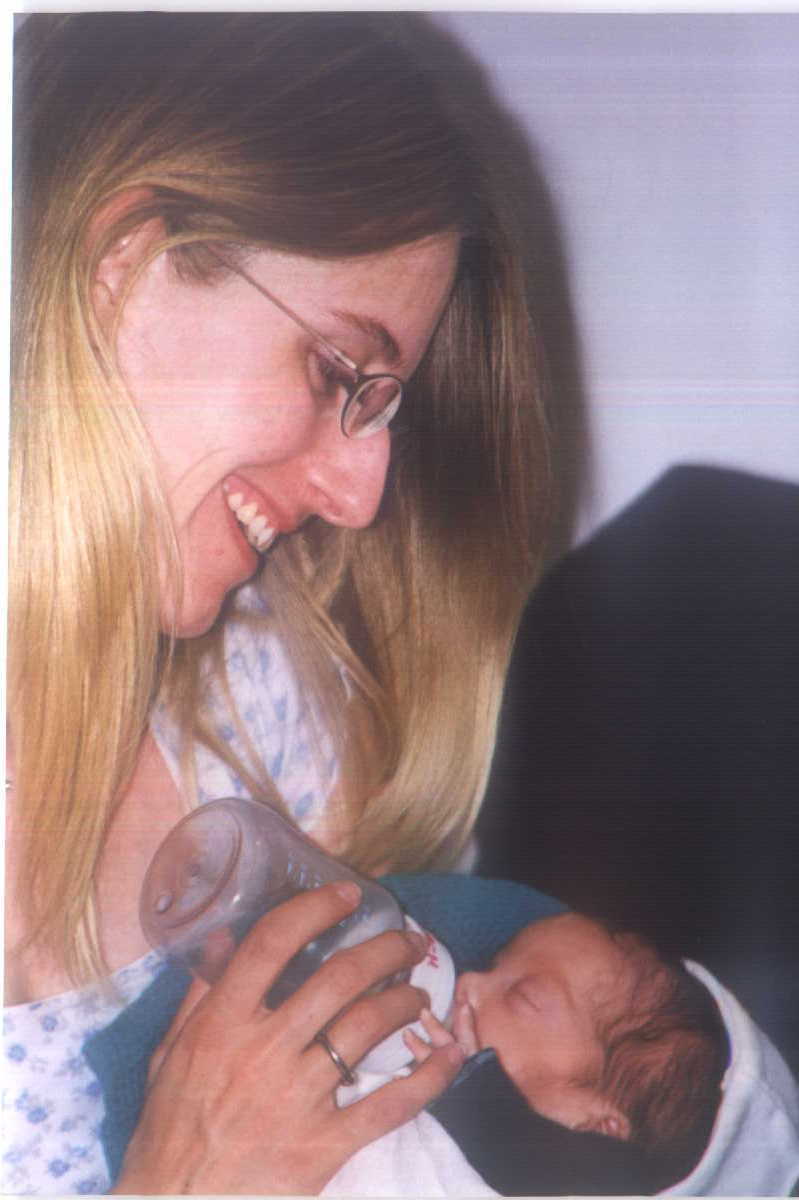 Mommy feeding Zach at home for the first time