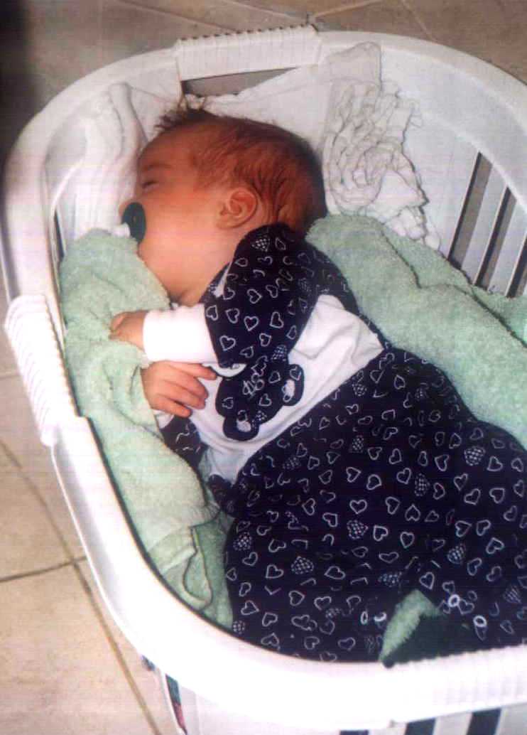 Zach in the clothes basket