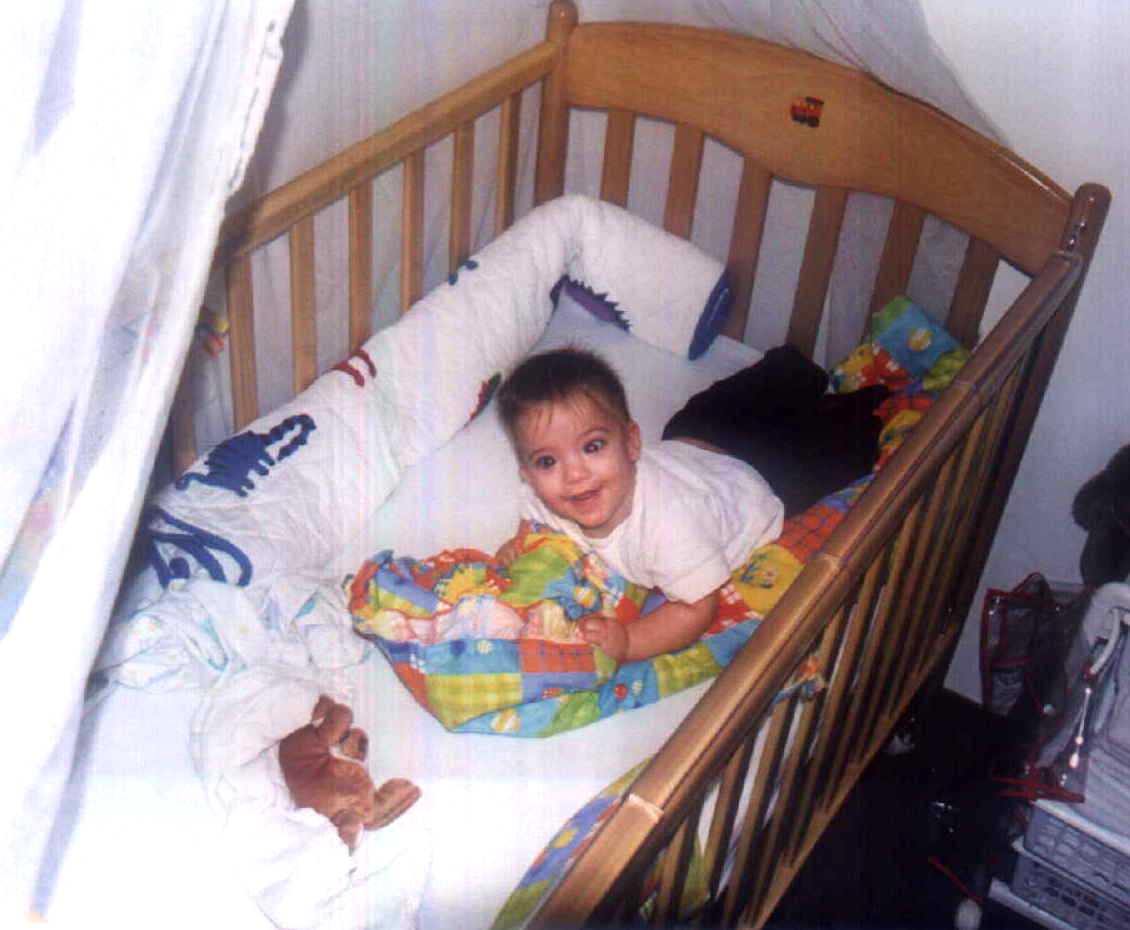 Zach making a mess of his bed