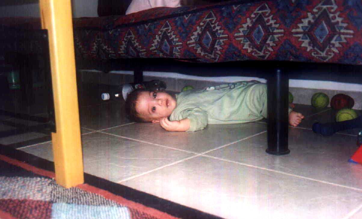 Zach stuck under the couch