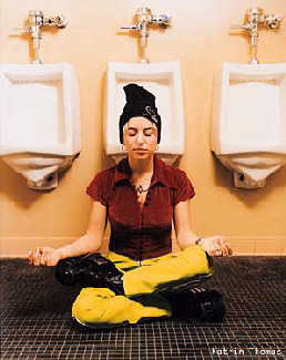 Ani meditating in the men's washroom