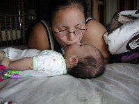 Getting some love from his momma........