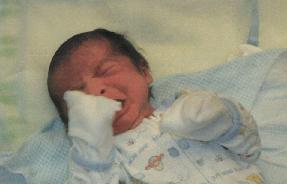 10 days old......and I still don't like getting changed.......