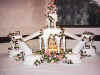 1 fountain, frosting and a few silk with ivy