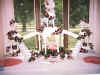 Fountain, ivy and pink frosting flowers