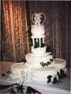 Real ivy on an ivory stacked cake