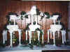 3 fountains with ivy and names on the cakes