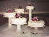 Silk flowers with pearls on cascading cakes