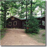 Butler's Whispering Pines is a spacious cottage nestled amongst towering pines, overlooking picturesque Waubee Lake