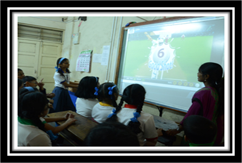A group of children watching a video

Description automatically generated