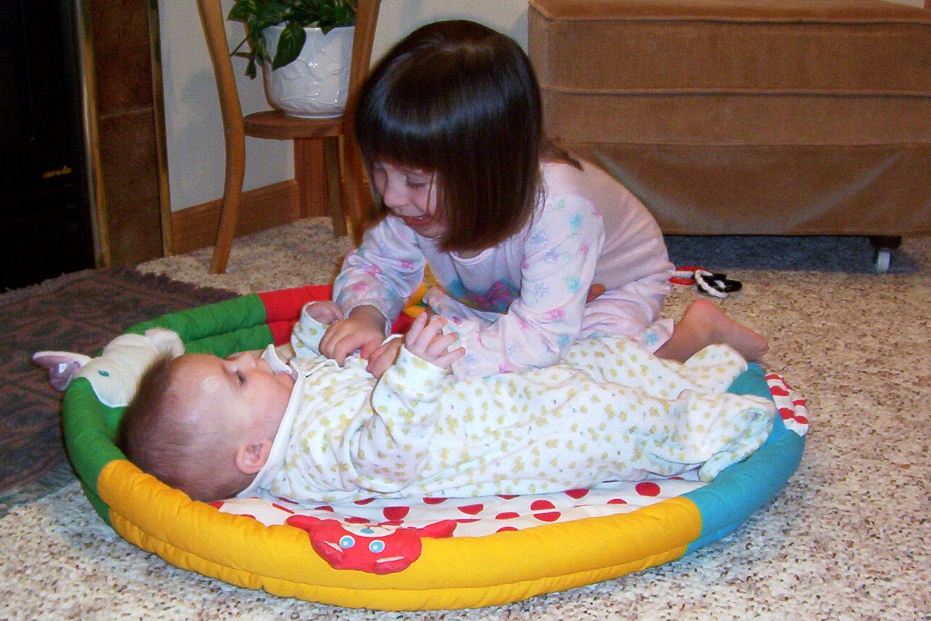 Morgan tickling Caleb