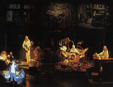 En av de siste konsertene med Gabriel som vokalist, her i rollen som Rael. Året er 1975