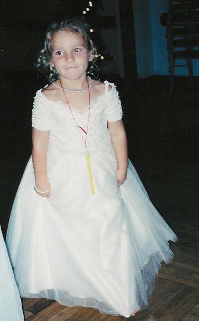 The prettiest flower girl I know doing the chicken dance!