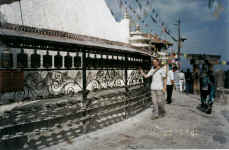 Spinning the prayer wheels at the Swayambhunath Bhuddist stupa