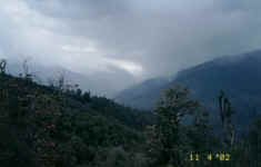 Watching the rain lashing against the hills in Gorepani