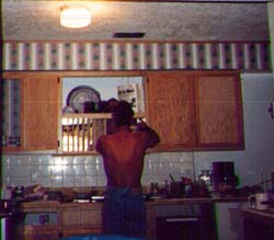Here is Jeff installing the dishholder over the sink.  He lots his inspiration & never finished the kitchen - which is why we are going to do it now!