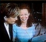 Karyn Dwyer as Angela Lam in Cheaters