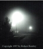 Lights through fog on Jefferson Street, Tecumseh, OK