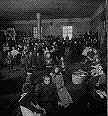 Immigrants at Ellis Island--source:http:/cmp1.ucr.edu/exhibitions/immigration_id.html