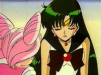 [Sailor Pluto talking to Chibi Moon not looking so happy]