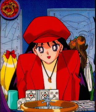 [Raye wearing a cool looking red suit]